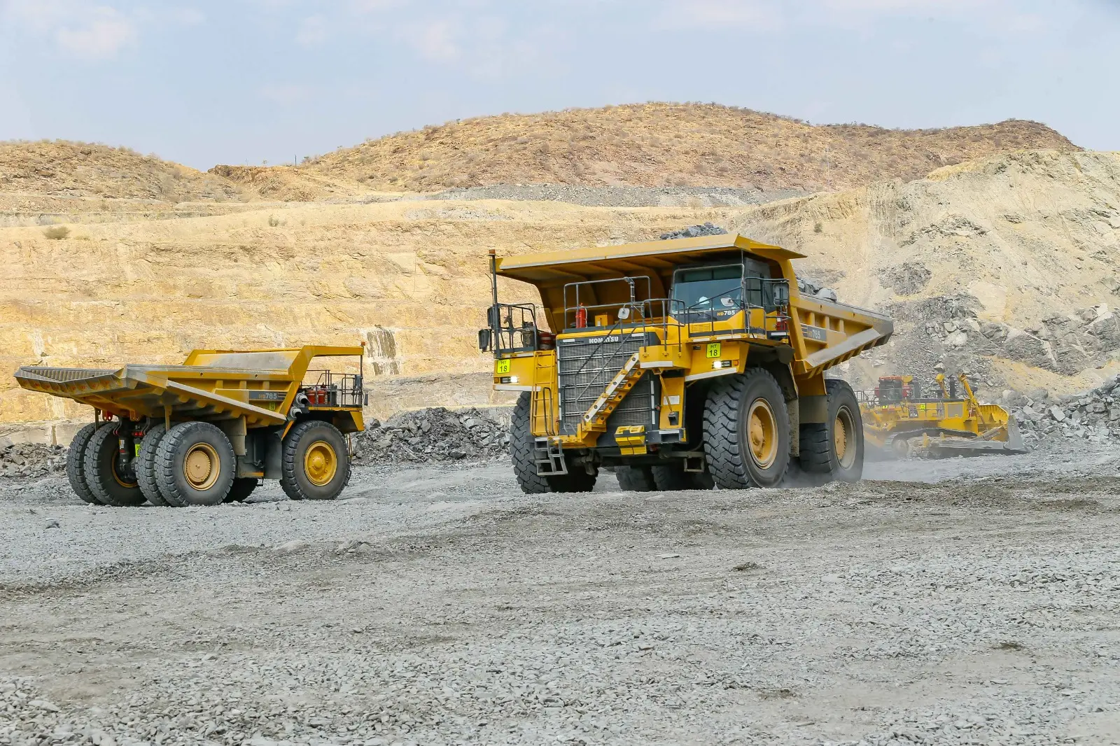Haul trucks working in an open-pit mine